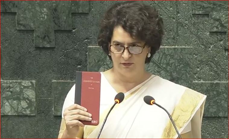 Photo of मैं प्रियंका गांधी…. एक हाथ में संविधान लेकर संसद में ली शपथ